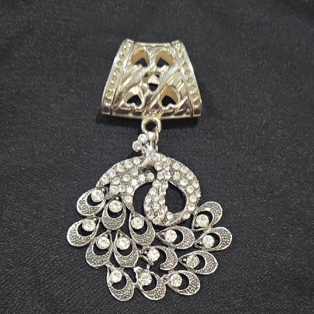 Vintage Silver-tone rhinestone peacock pendant. 